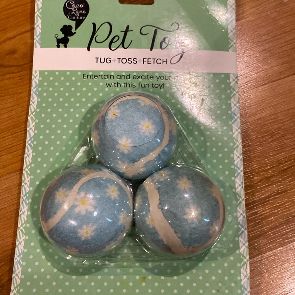 - Brand New Set Of Tennis Balls For Dog.